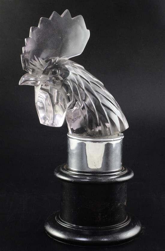 Tête de Coq/Cocks Head. A glass mascot by René Lalique, introduced on 3/2/1928, No.1137 Height 21cm with mount, 29.5cm overall.